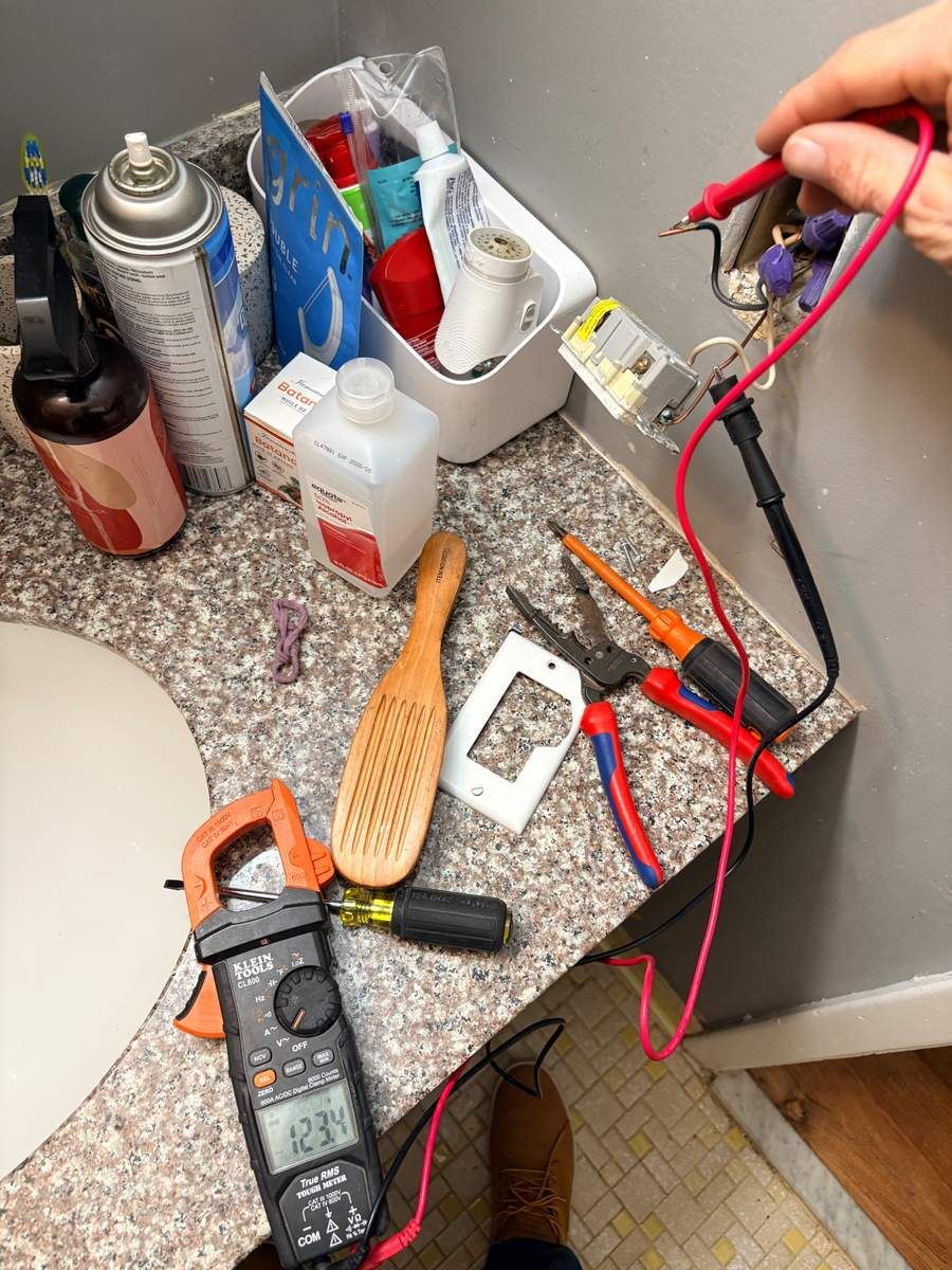 Electrical troubleshooting with multimeter in coastal NC home